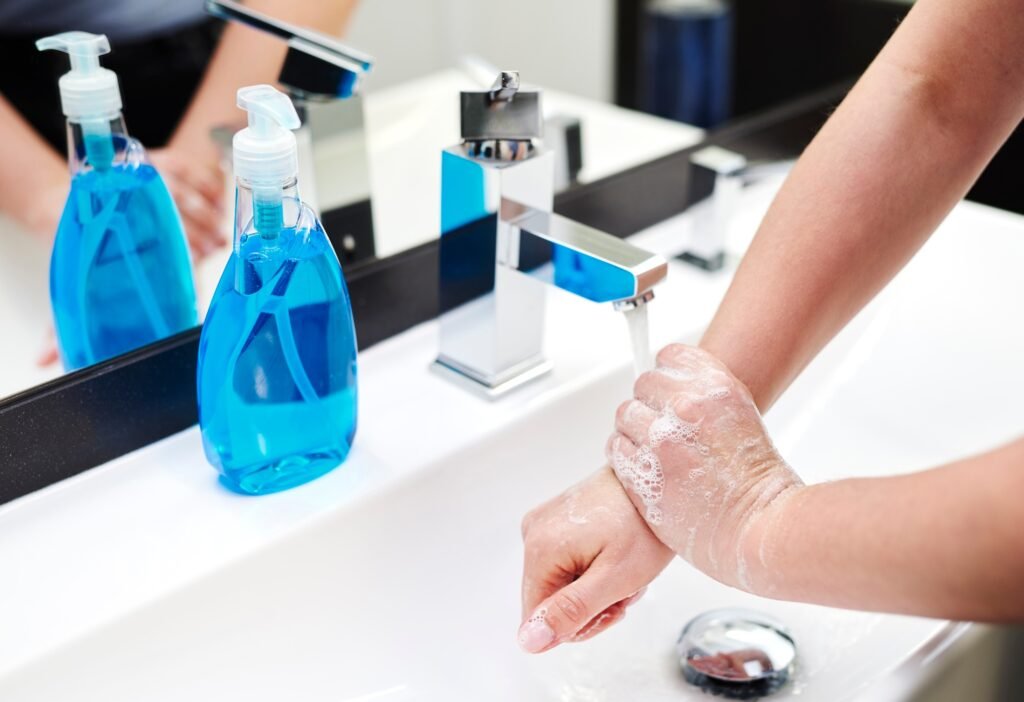 Daily hands washing in the bathroom